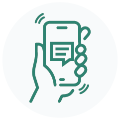 A navy blue hand holding a phone icon on a circular light grey background.